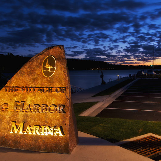 The Village of Egg Harbor sign on rock