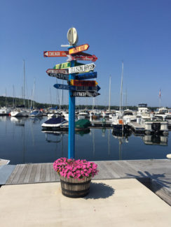Cool street sign by pier