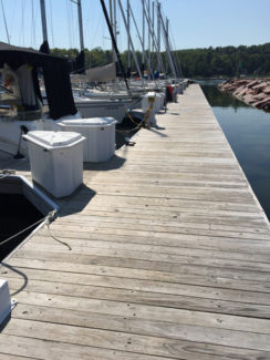 Boardwalk with boats parked