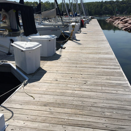 Boardwalk with boats parked